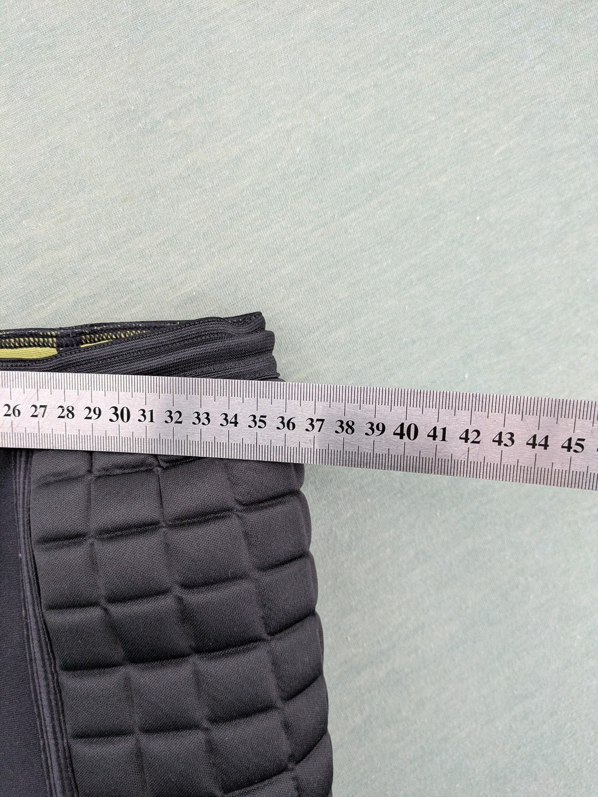 Select padded goalkeeper shorts black with robust hip and tailbone padding.