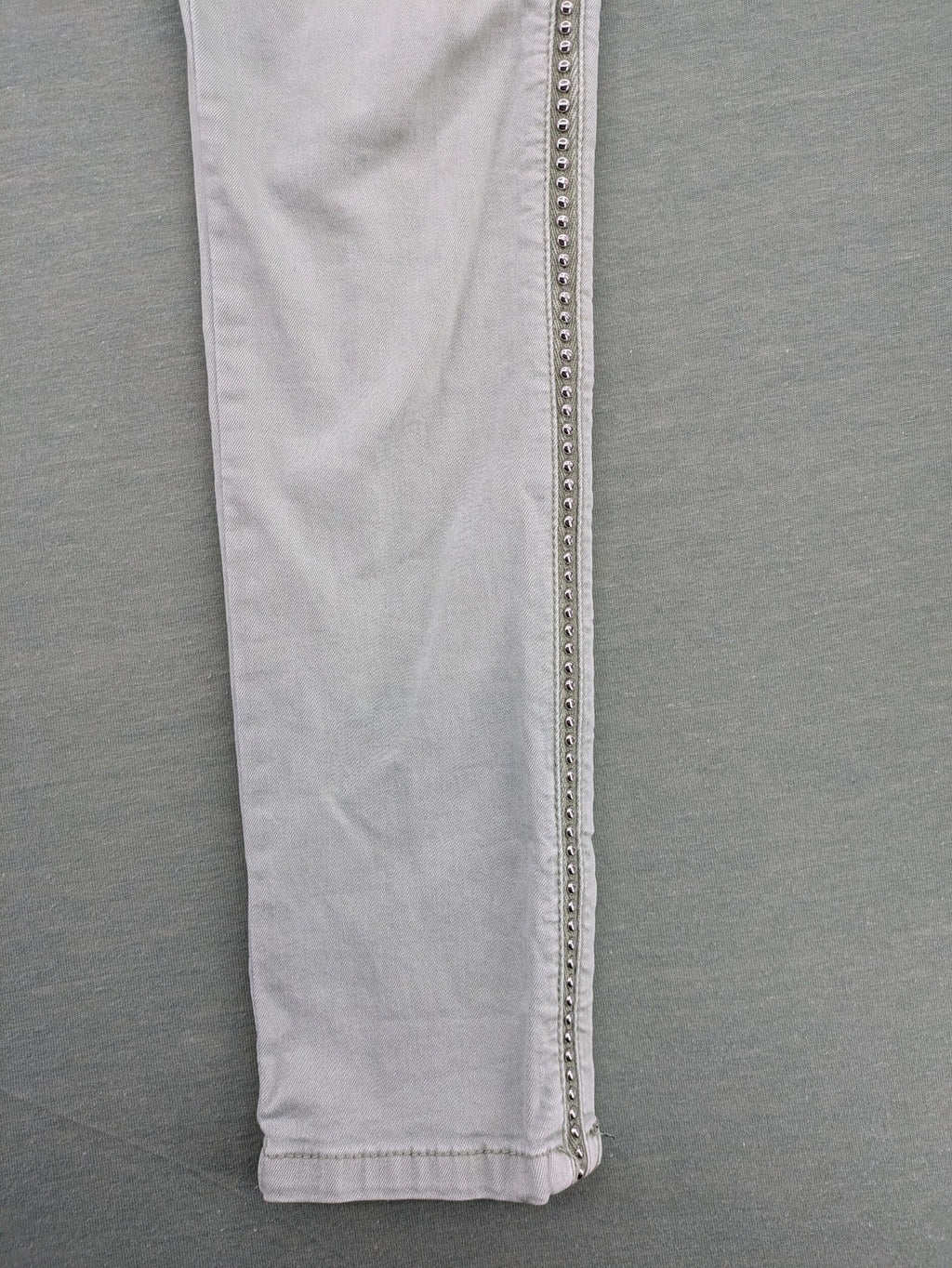 Jewelly grey straight jeans slim fit with silver decorative studs along side seams.