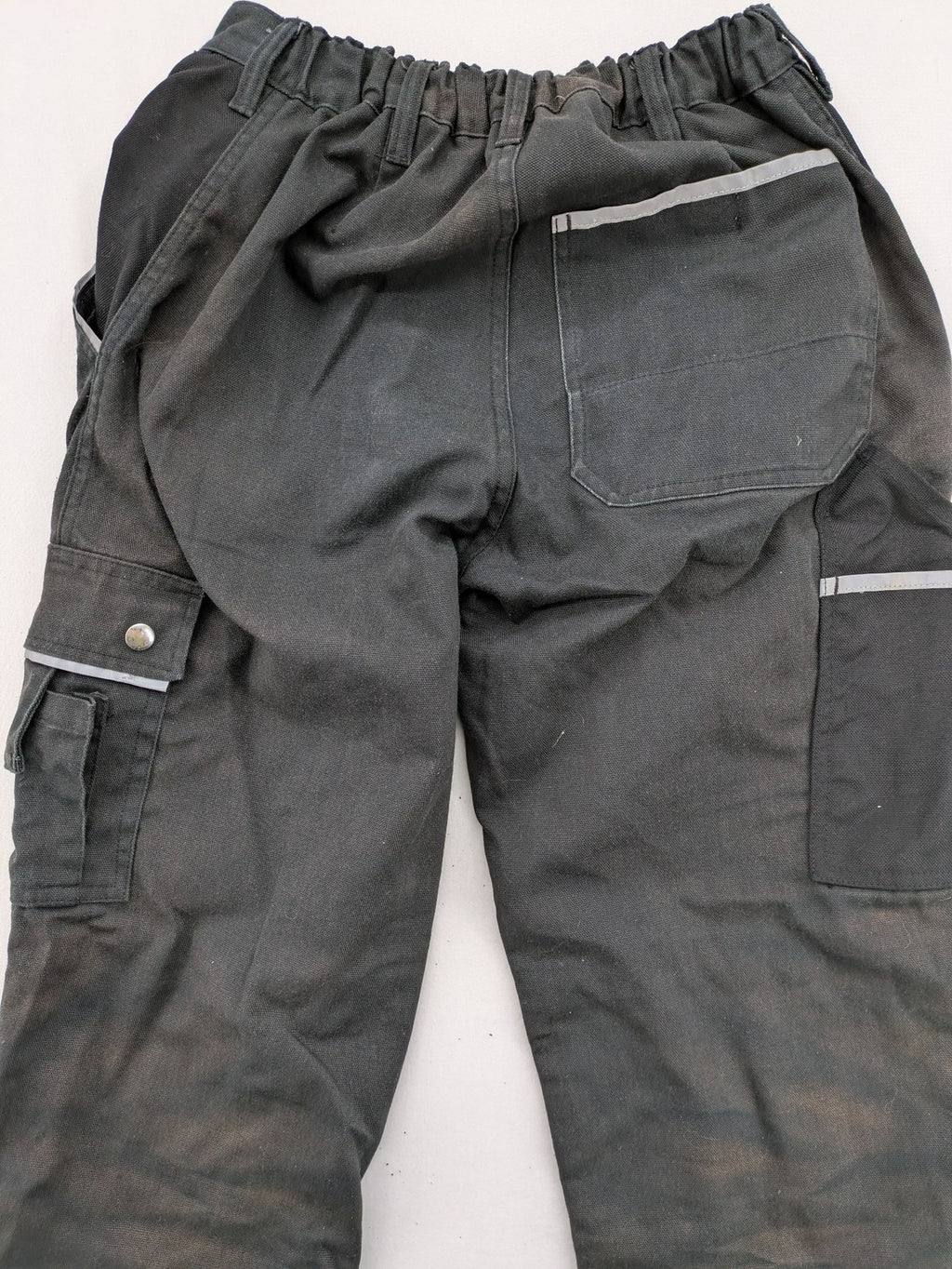 Planam work trousers black canvas with Cordura knee reinforcement and cargo pockets.
