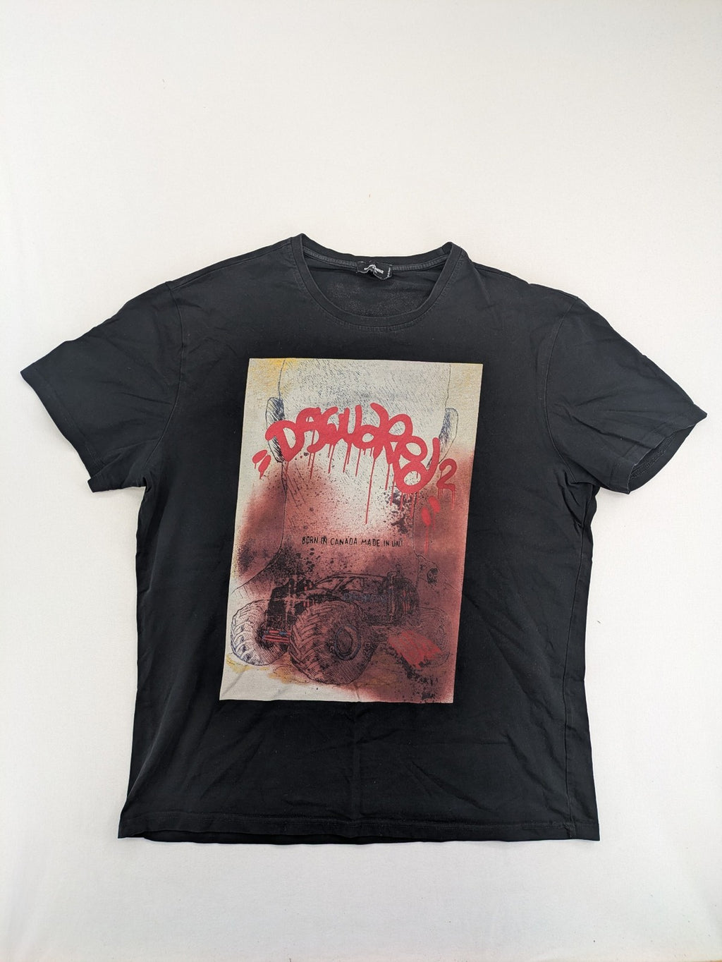 Dsquared2 multi graphic t-shirt featuring bold monstertruck print and graffiti-style logo.