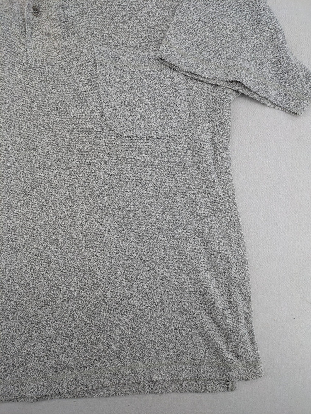 Headlands grey short sleeve polo shirt textured terry fabric with chest pocket.