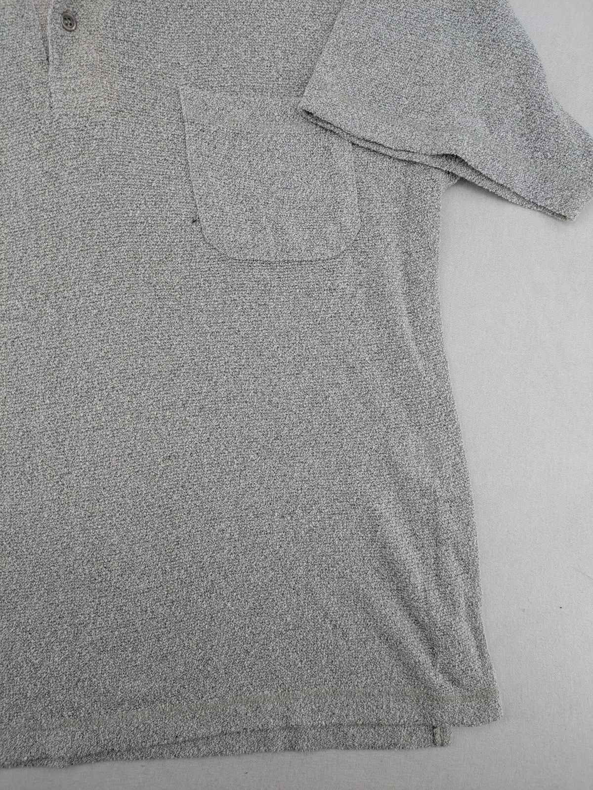 Headlands grey short sleeve polo shirt textured terry fabric with chest pocket.