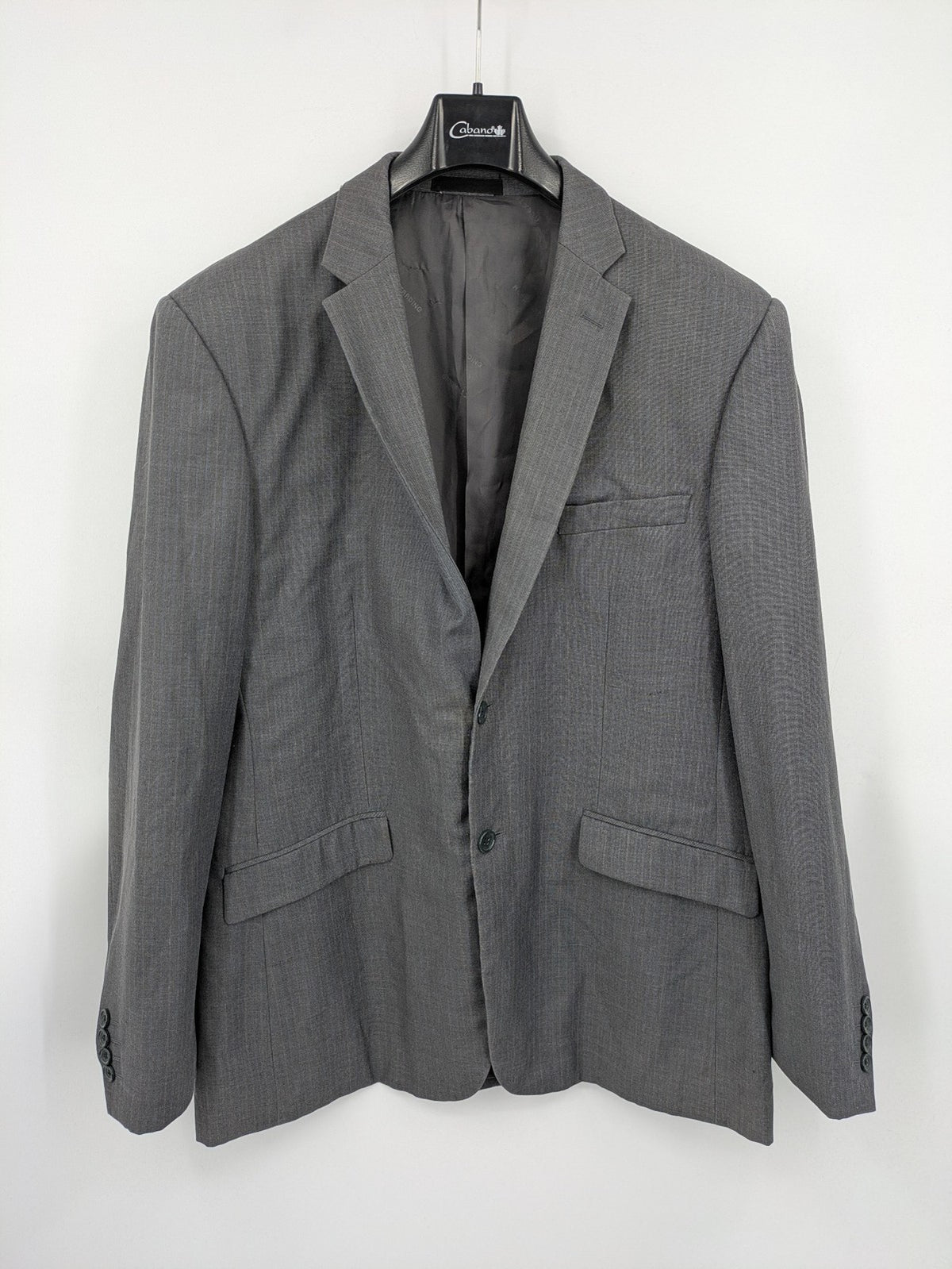 Alextrading grey jacket with subtle light blue pinstripe pattern and notch lapels.