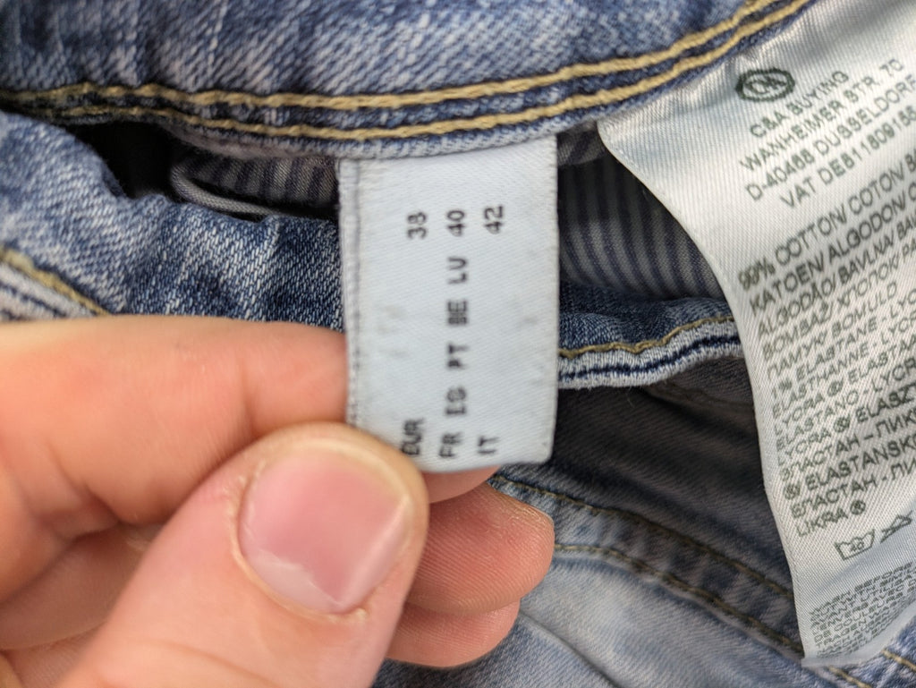 C&A blue bootcut jeans with faded denim and low rise fit, made from cotton blend.