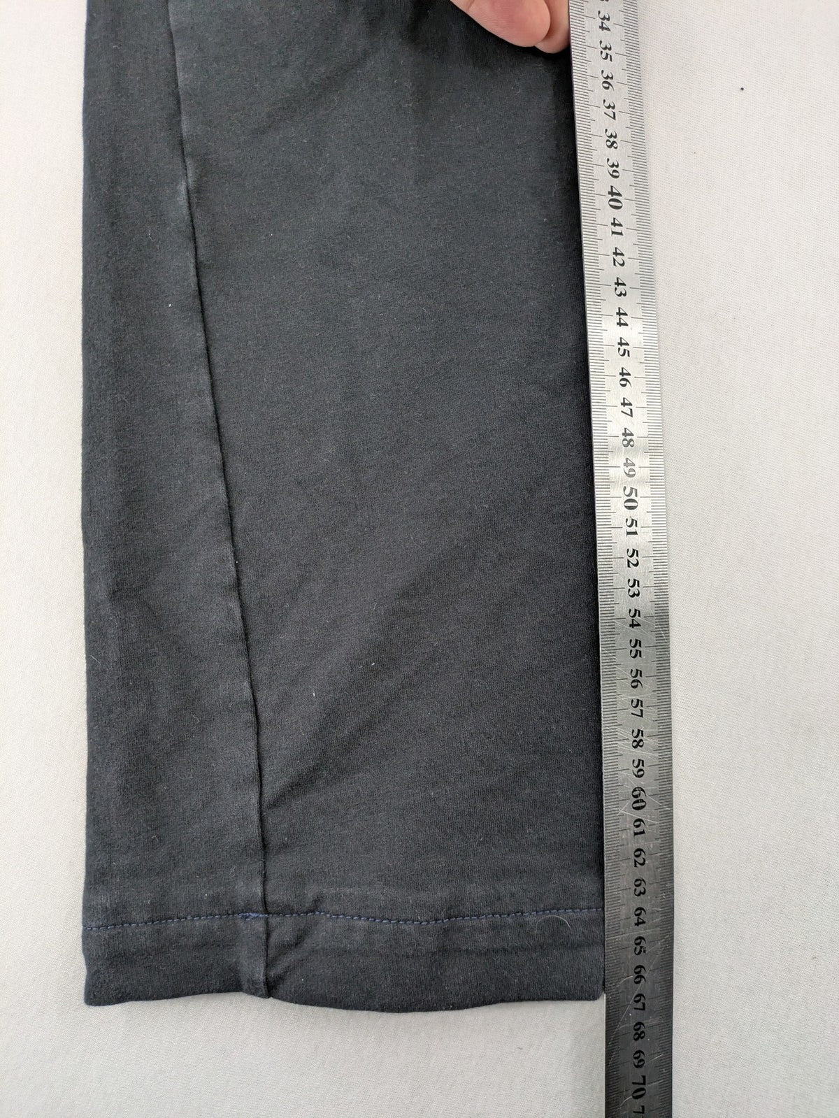 Manguun Sports grey jogger pants soft cotton blend with subtle logo embroidery and elastic waistband.