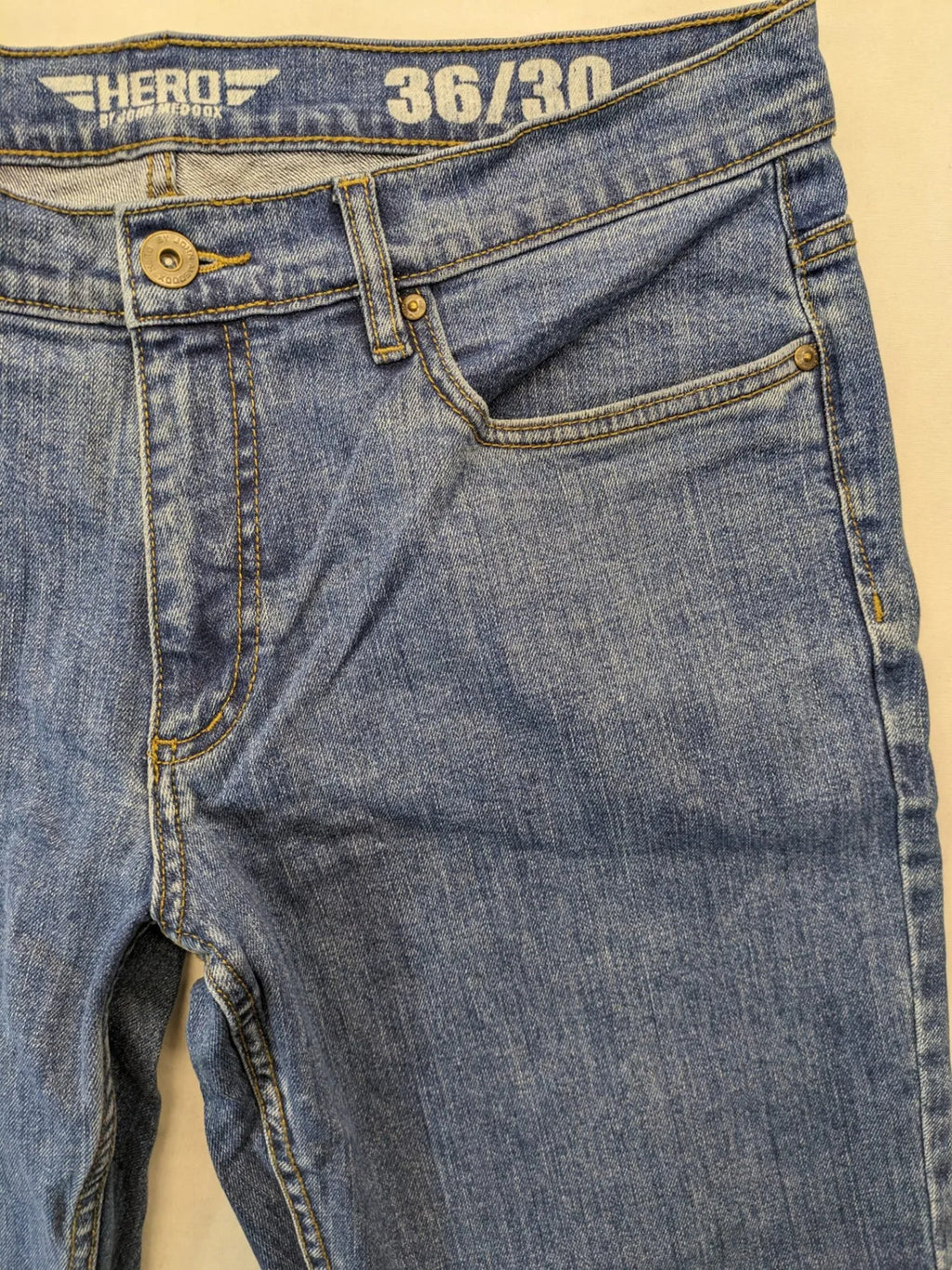 Hero By John Meddox blue straight jeans with five-pocket design and zip fly.