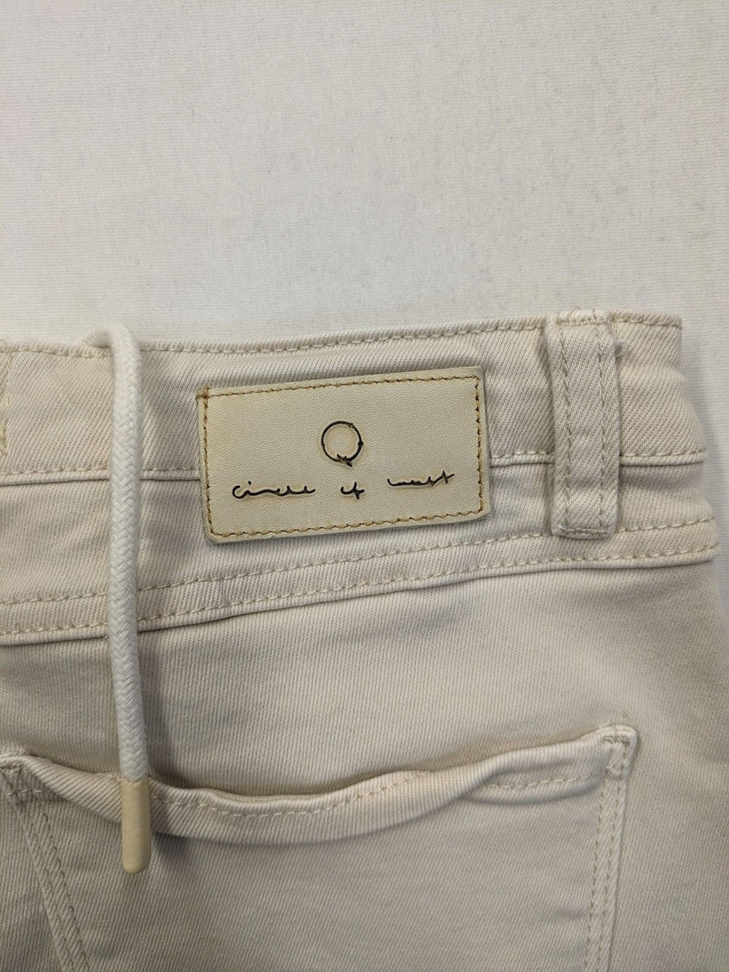 Circle Of Trust beige straight jeans with elastic waistband, drawstring, and classic 5-pocket design.