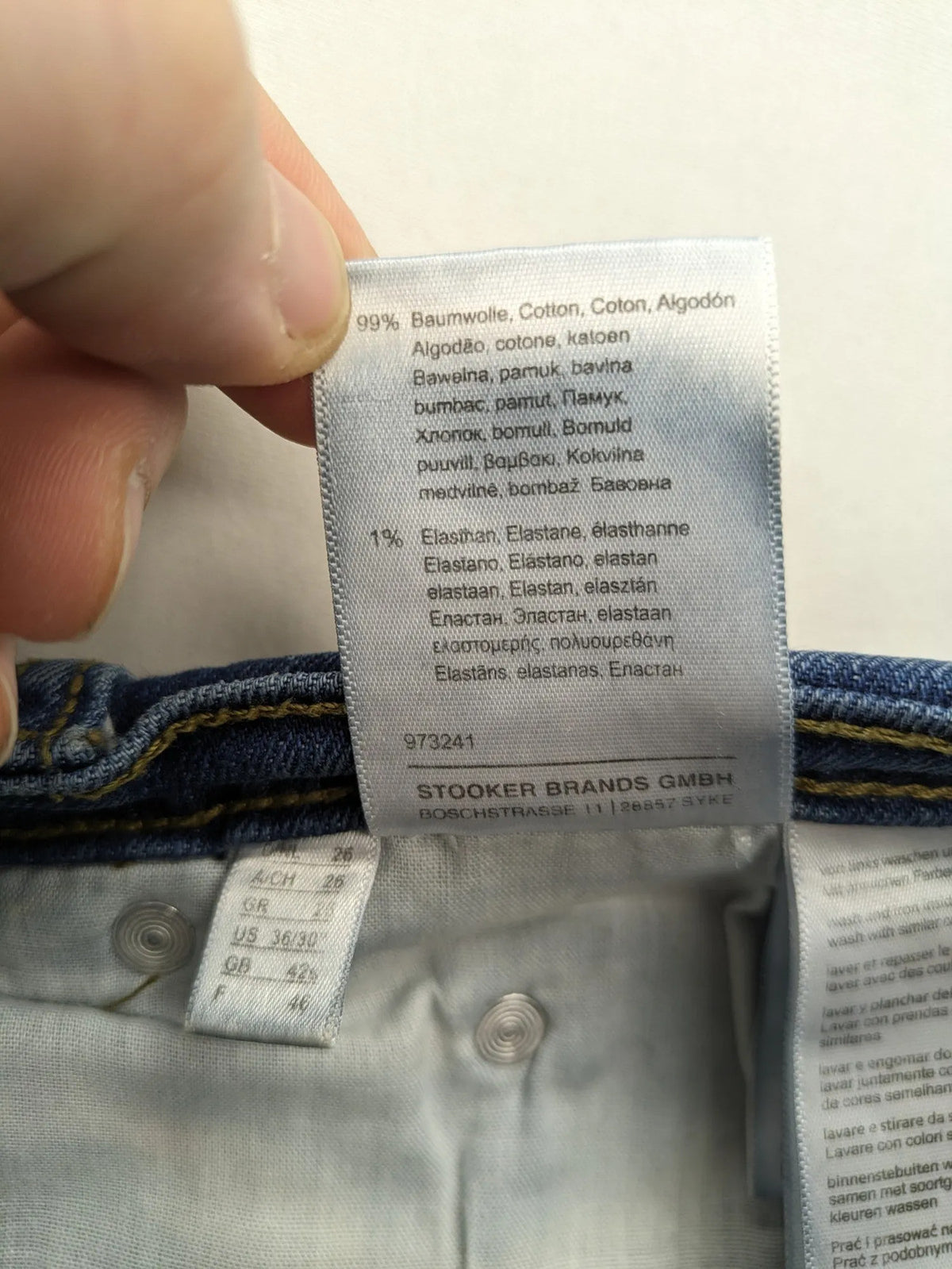 Hero By John Meddox blue straight jeans with five-pocket design and zip fly.