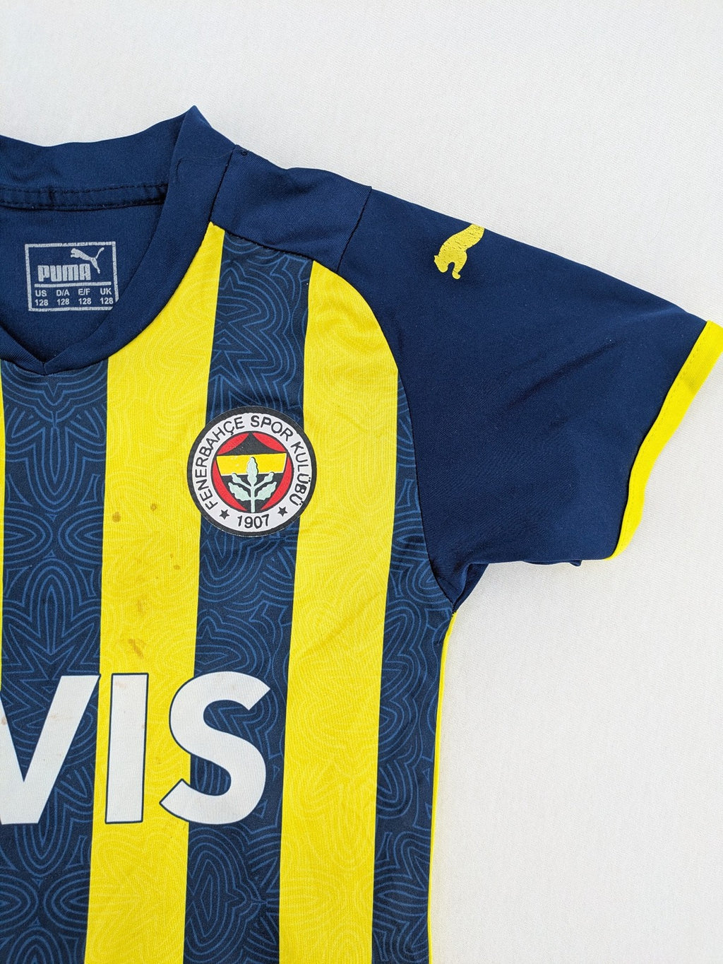 Puma Fenerbahçe kids jersey navy yellow with striped pattern and embroidered club logo.