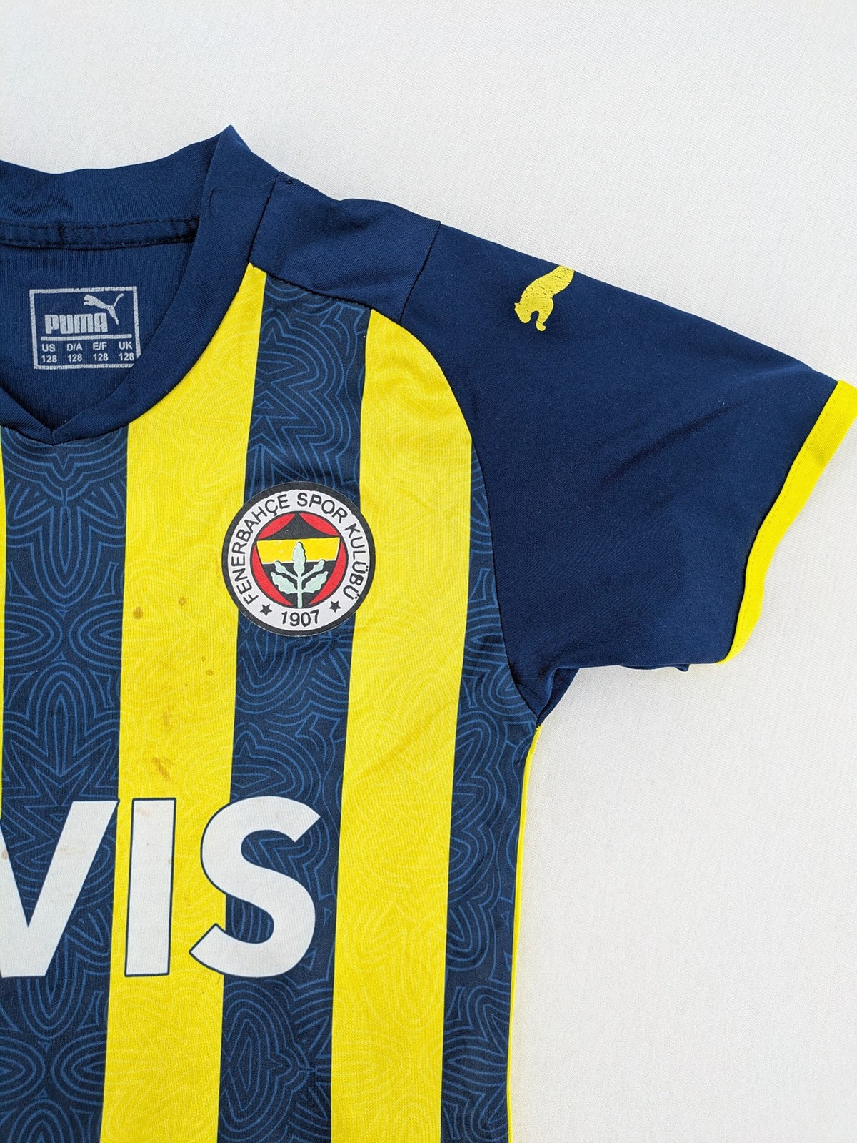 Puma Fenerbahçe kids jersey navy yellow with striped pattern and embroidered club logo.