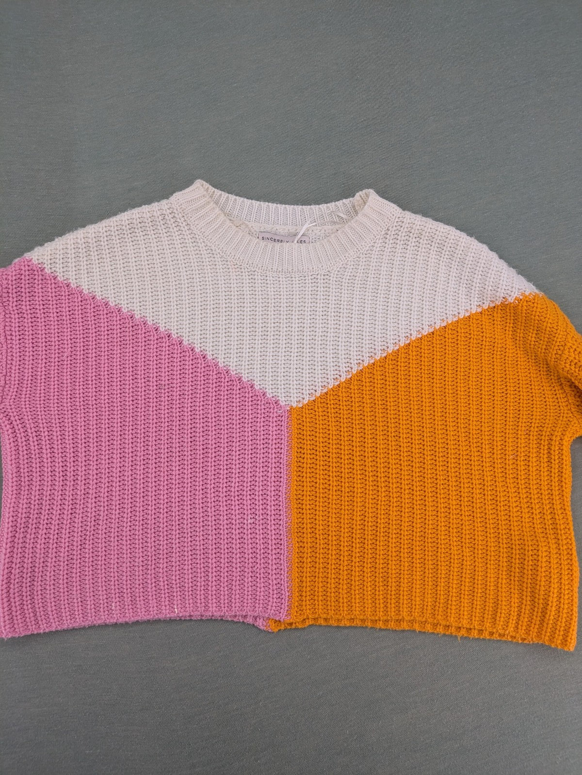 Sincerely Jules orange and pink colorblock turtle neck jumper with soft acrylic fabric.