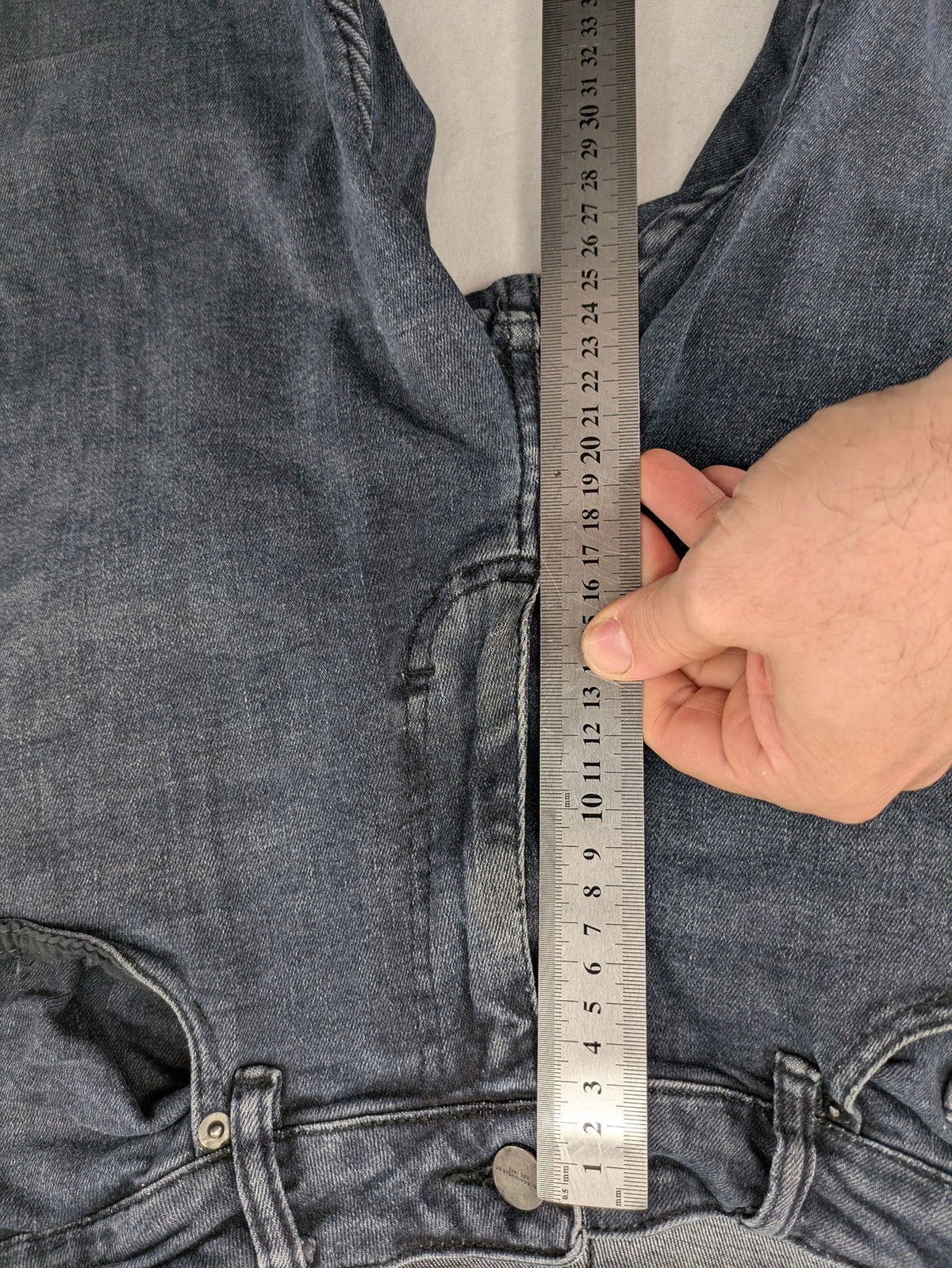 Zara blue slim fit jeans with classic 5-pocket design and subtle wash effect.