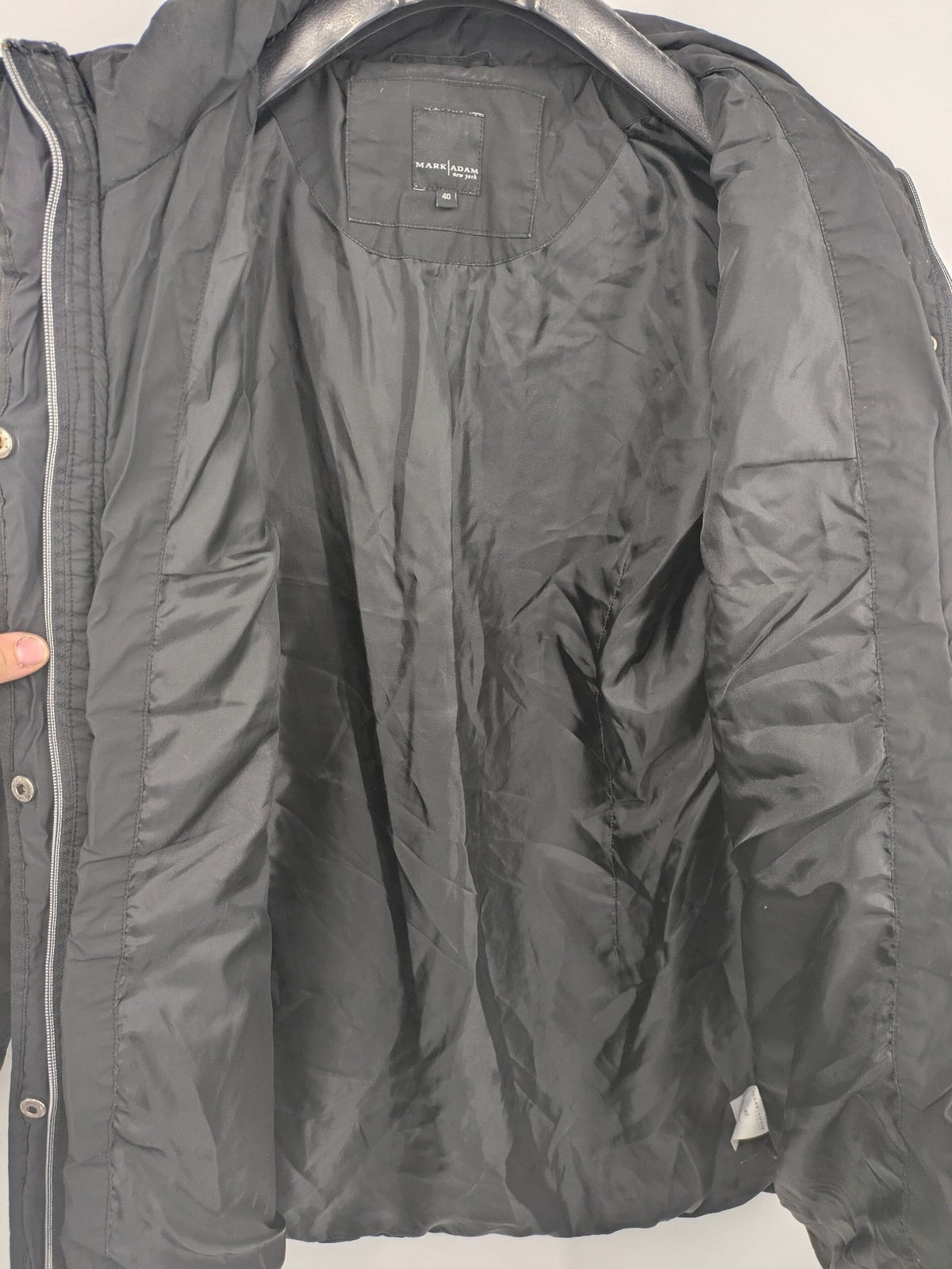 Mark Adam grey quilted jacket with high collar and buttoned flap pockets.