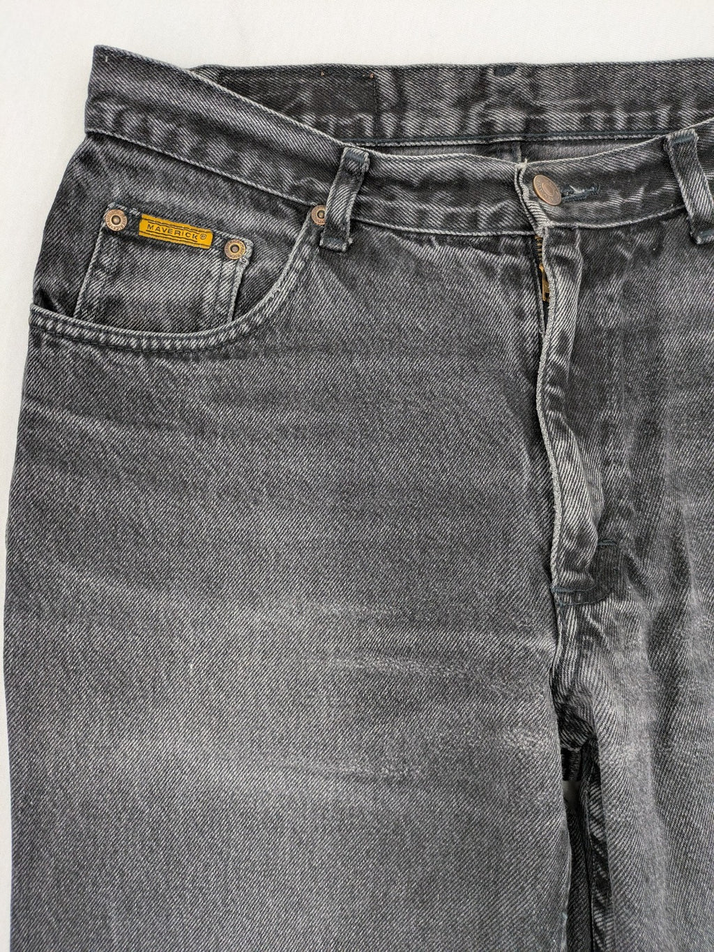 Maverick black straight jeans faded wash with iconic logo on back patch.