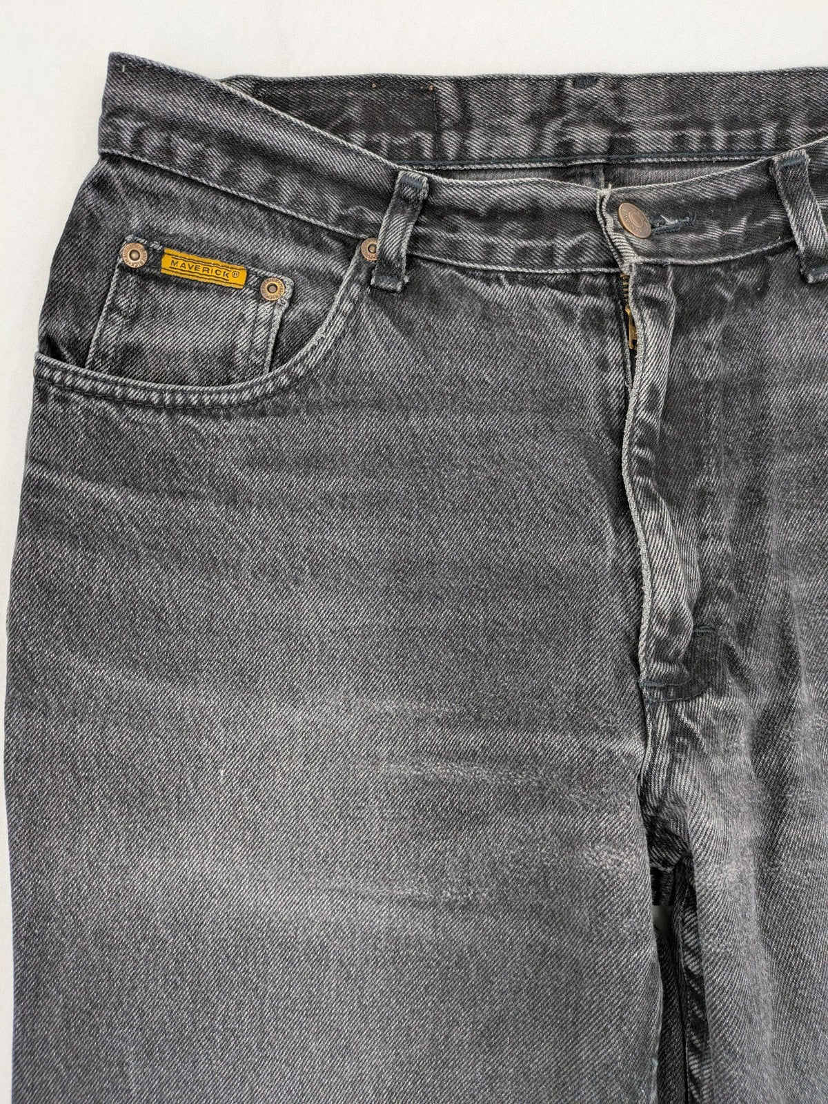 Maverick black straight jeans faded wash with iconic logo on back patch.