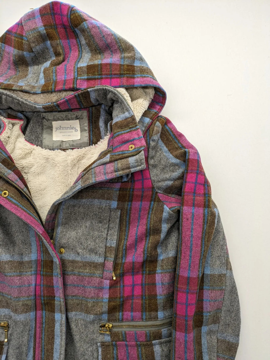 Johnnie B pink coat with gray check pattern, Sherpa lining, and zip closure.