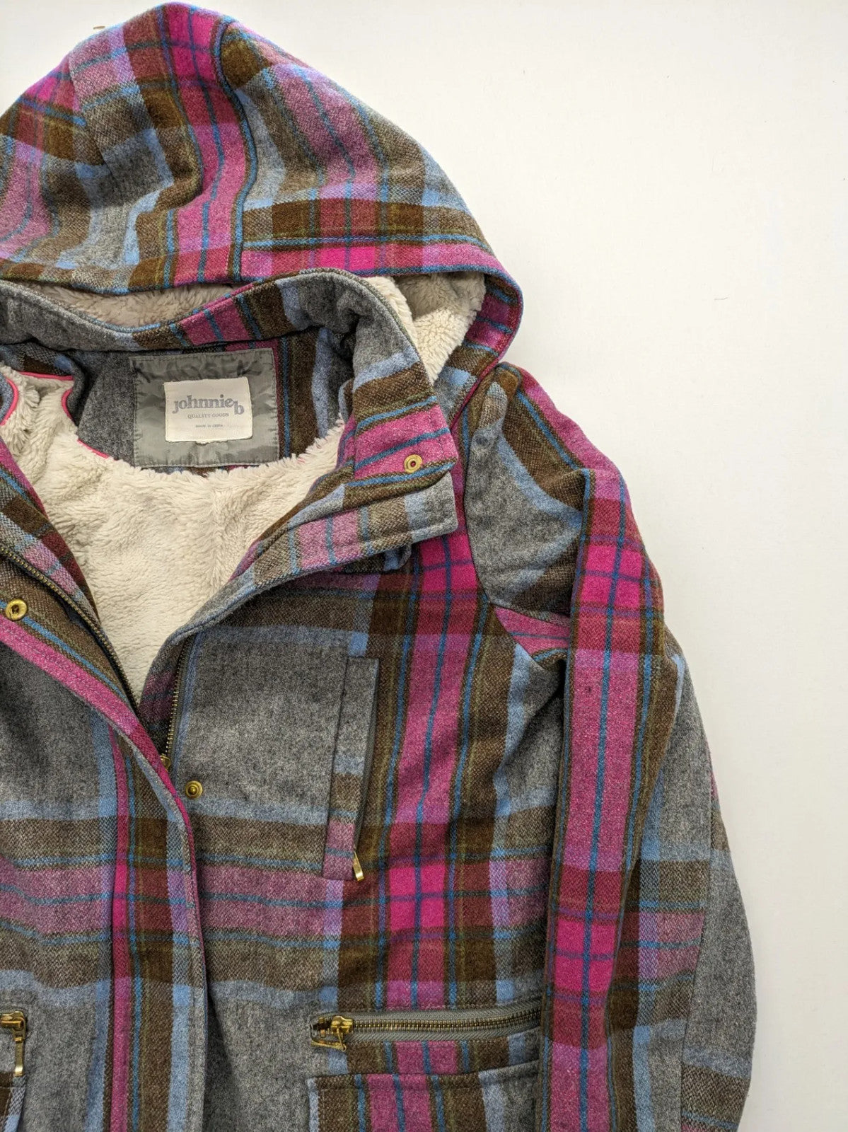 Johnnie B pink coat with gray check pattern, Sherpa lining, and zip closure.