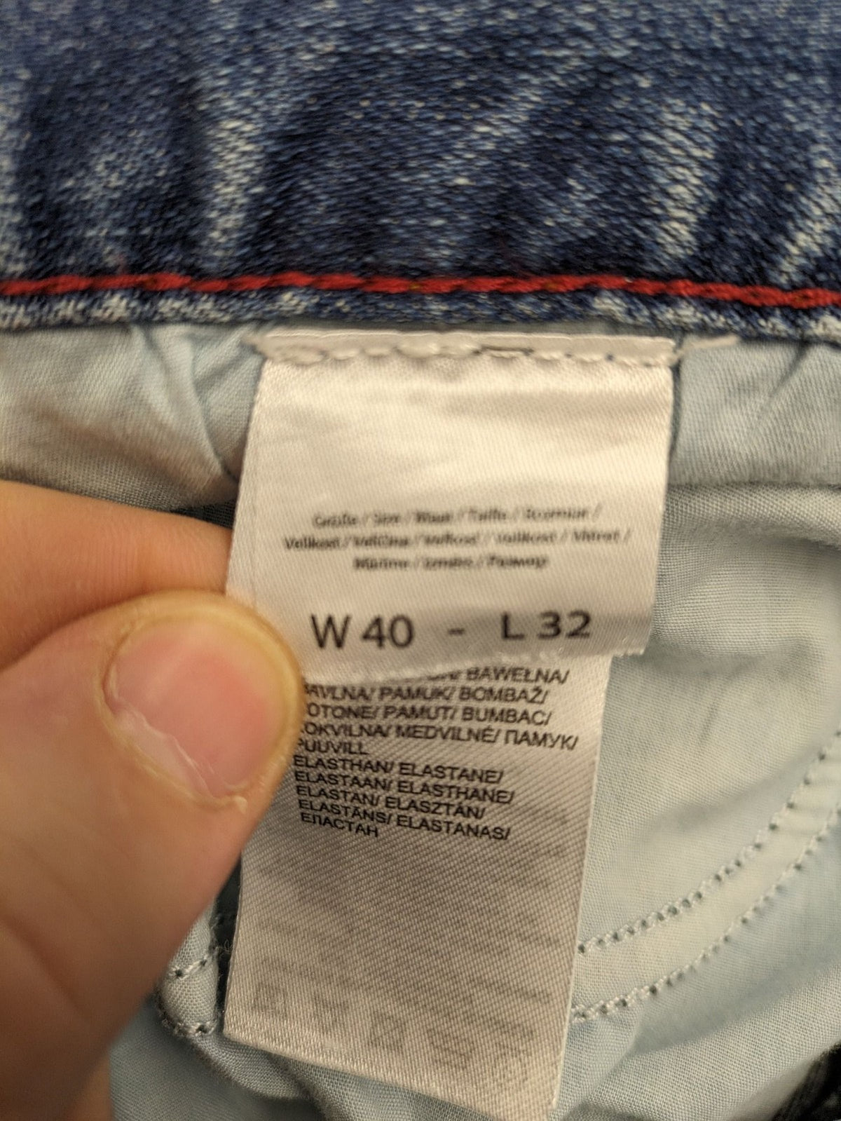 Montego blue straight jeans with stretch denim, classic design, and regular fit.