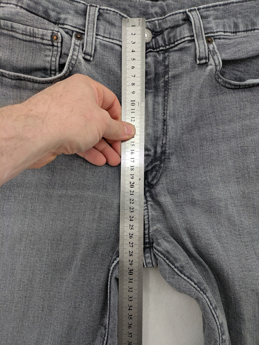Levi's red straight jeans with classic 5-pocket design and slim taper fit.