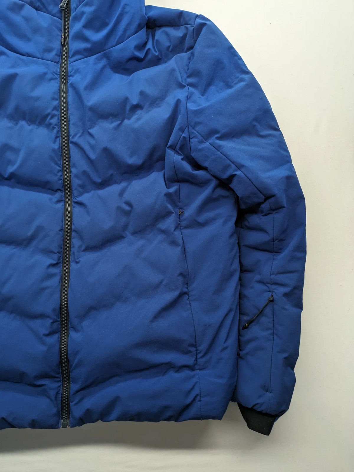 C&A blue winter jacket with hood, zip closure, and multiple pockets, used condition.
