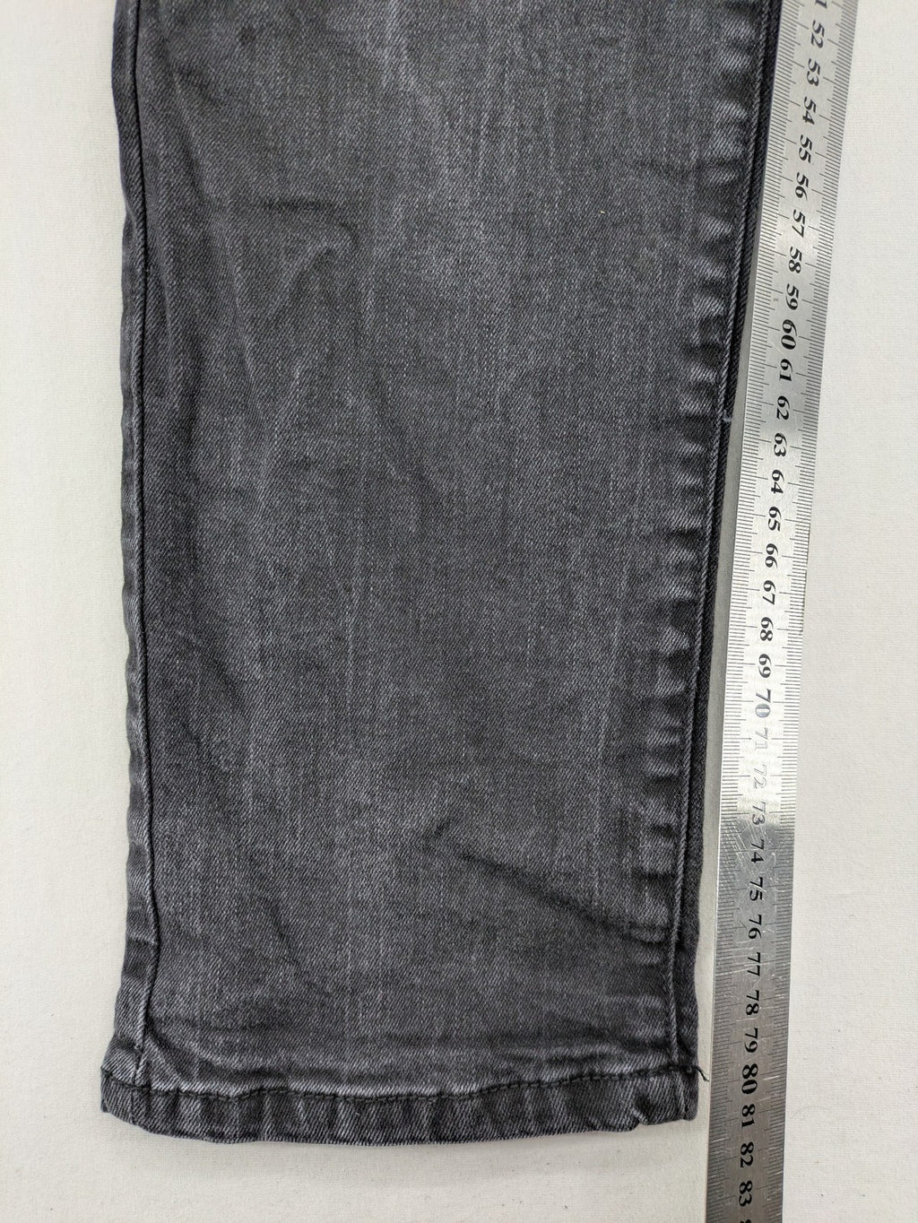 Denim 1982 grey slim fit jeans with ripped knee detail and distressed finish.