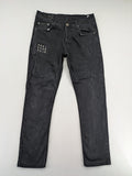 Philipp Plein black straight jeans with distressed finish and skull patch detail.