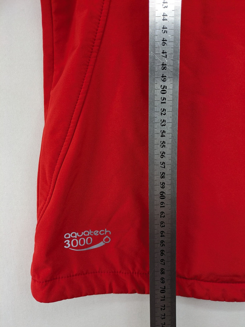 4F red softshell jacket with fleece lining and Aquatech 3000 logo detail.