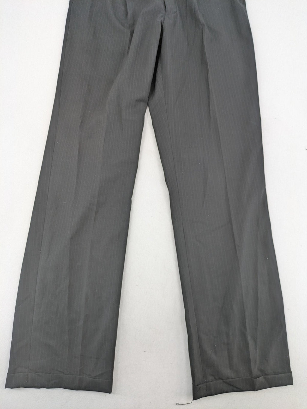 Wahl grey dress pants with pinstripe pattern and pleats, featuring side and back pockets.