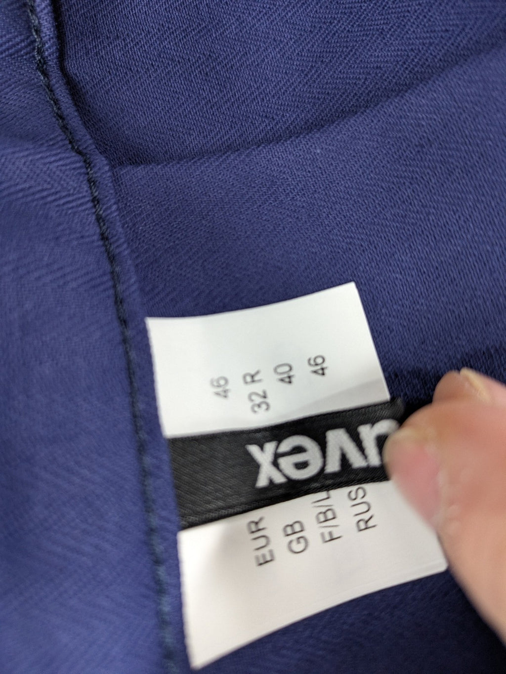 Uvex navy work trousers 100% cotton with button closure and belt loops.