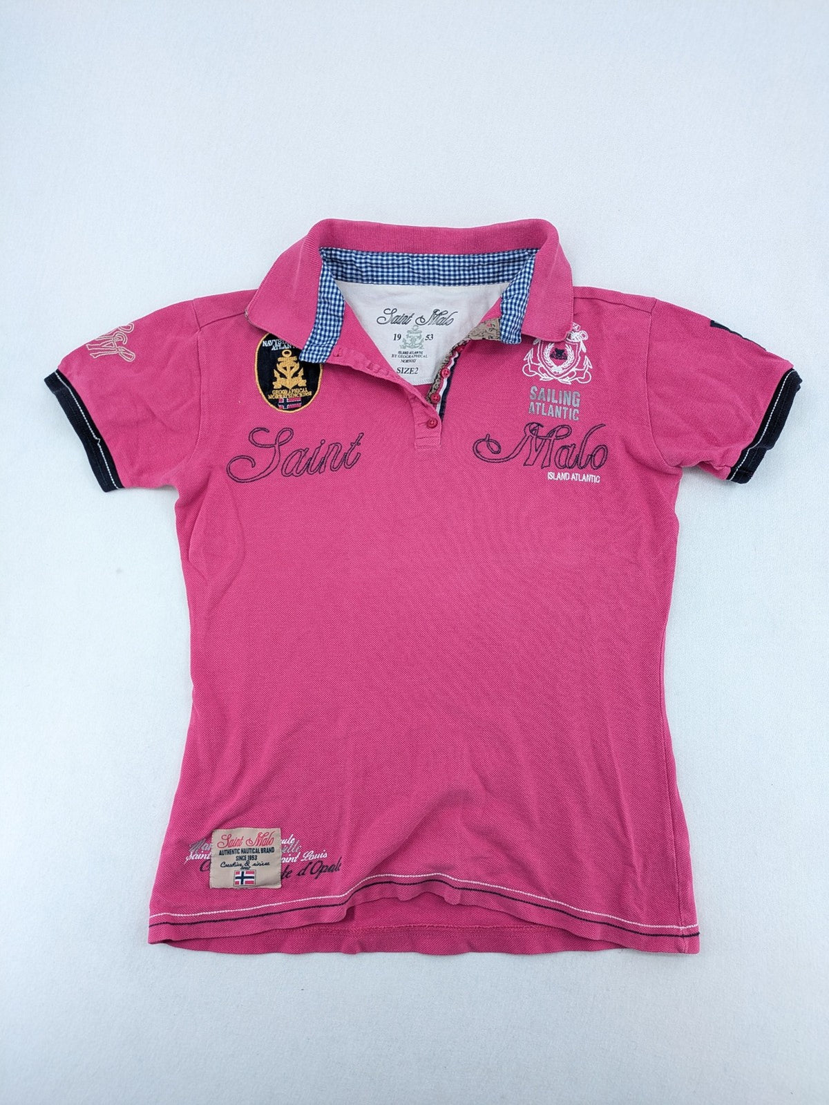 Geographical Norway pink polo shirt with embroidered Saint Malo design and Gingham trim.