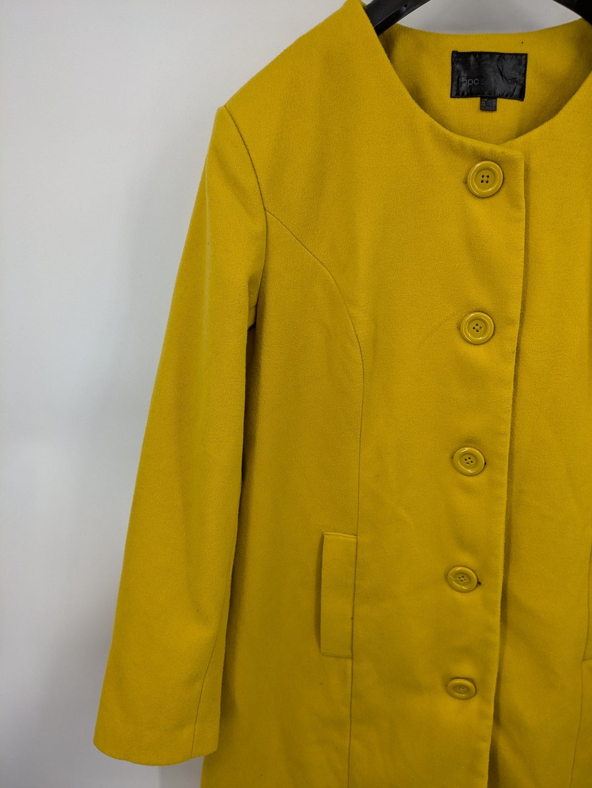 Bpc Selection yellow jacket kragenlos design with button placket and front pockets.