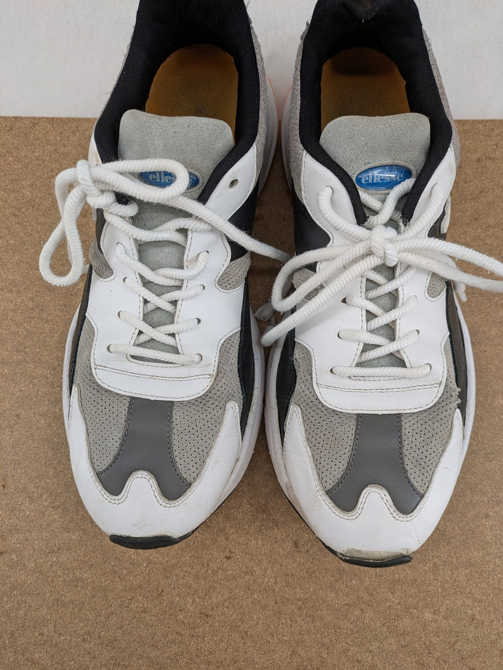 Ellesse Aurora chunky sneakers white grey with orange accents and multi-material upper.
