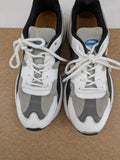 Ellesse Aurora chunky sneakers white grey with orange accents and multi-material upper.