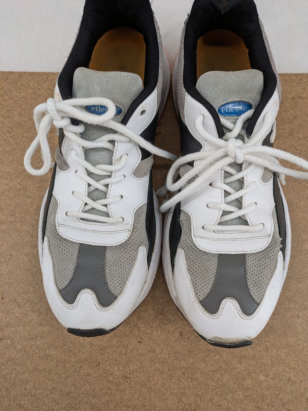 Ellesse Aurora chunky sneakers white grey with orange accents and multi-material upper.