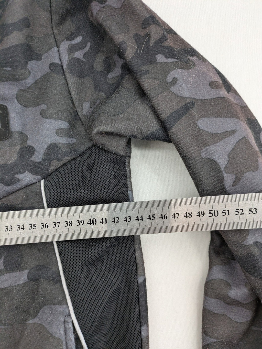 Everlast black grey camouflage jacket with full zip and attached hood.