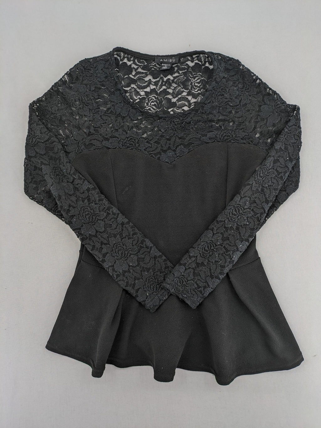 Amisu black peplum top with floral lace sleeves and delicate lace trim.