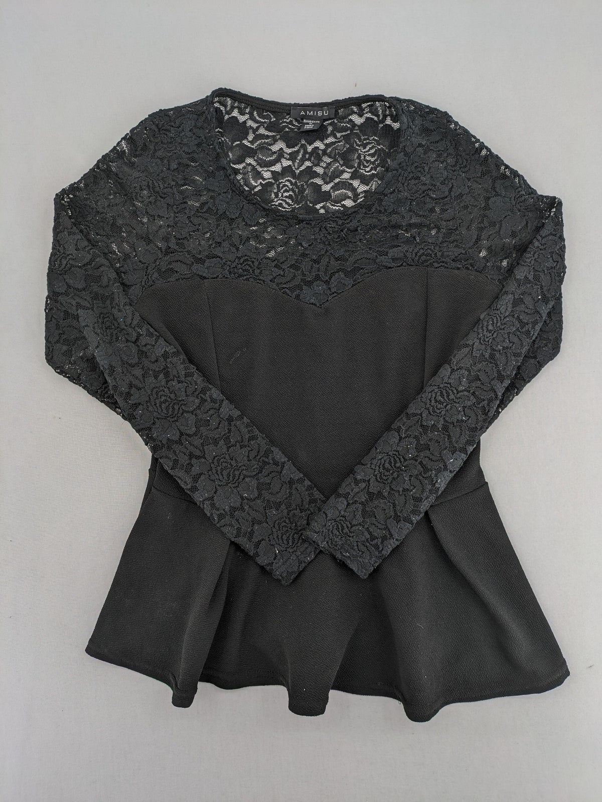 Amisu black peplum top with floral lace sleeves and delicate lace trim.