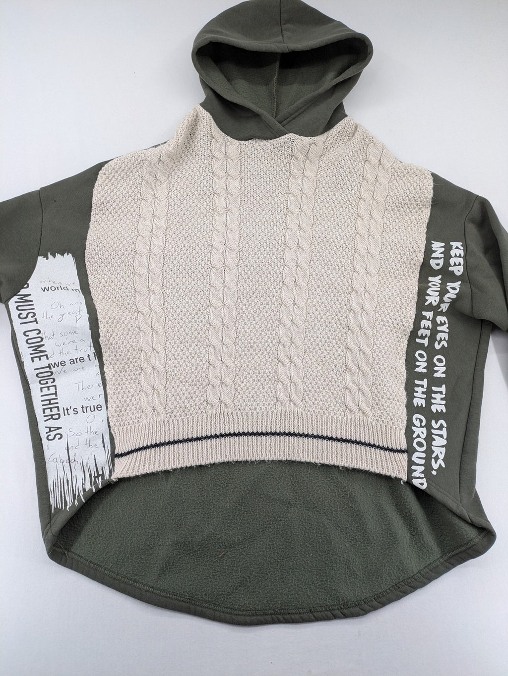 DCJ cream and olive green hoodie with cable knit pattern and graphic text sleeves.