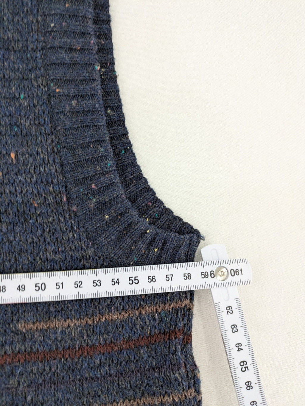Angelo Litrico blue vest with V-neck, striped pattern, and textured melange design.