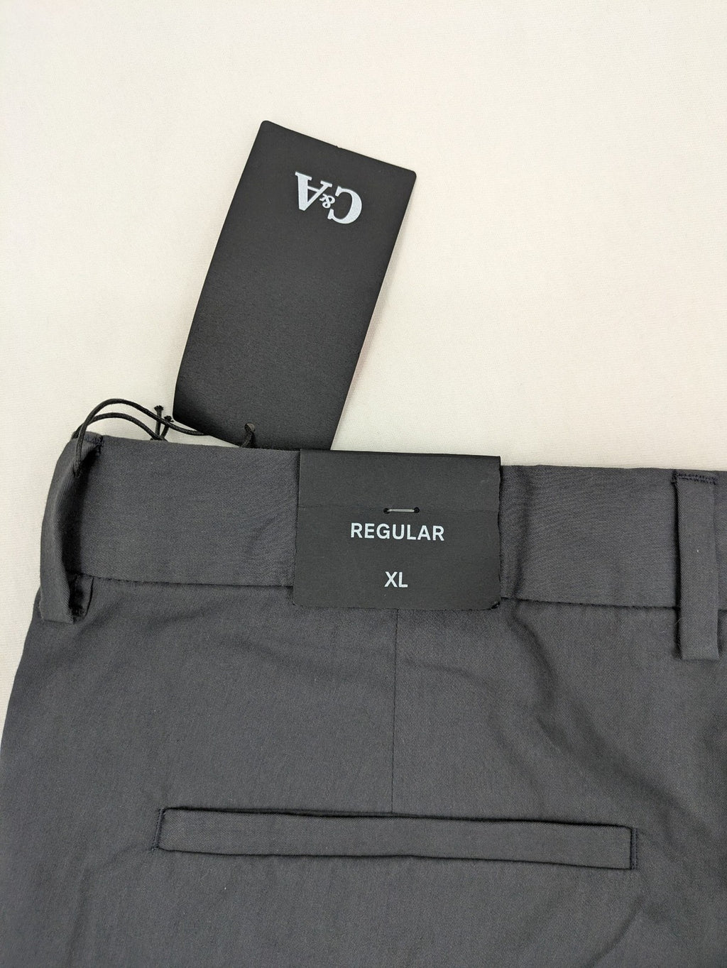 C&A pink pants regular fit with tag, versatile for business and leisure.