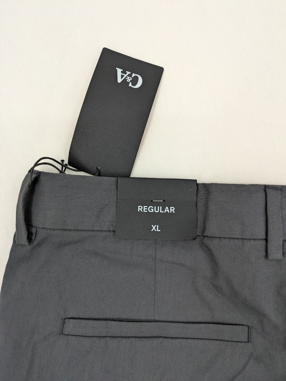 C&A pink pants regular fit with tag, versatile for business and leisure.