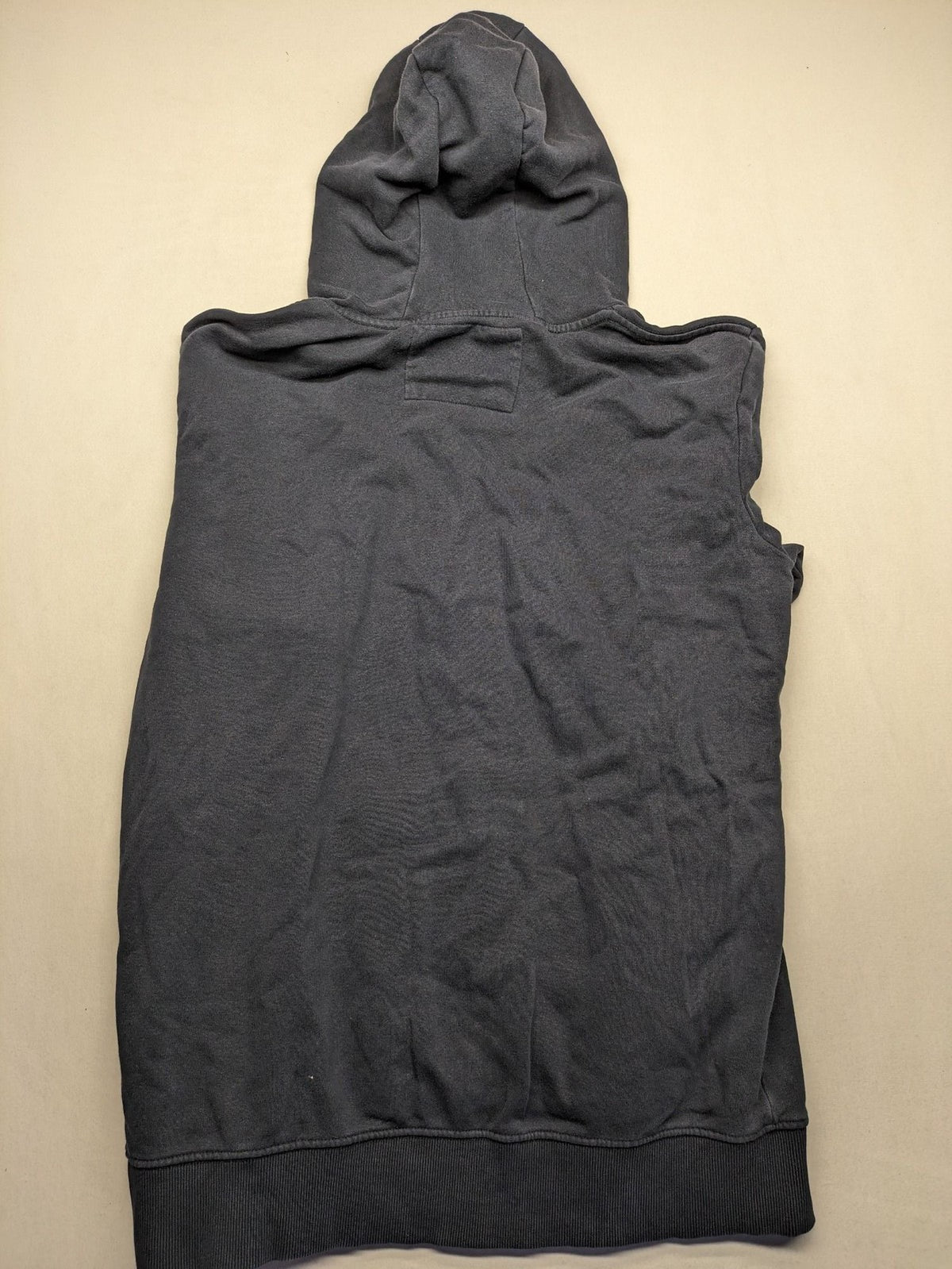 Quiksilver grey hoodie with logo graphic, kangaroo pocket, and adjustable hood.