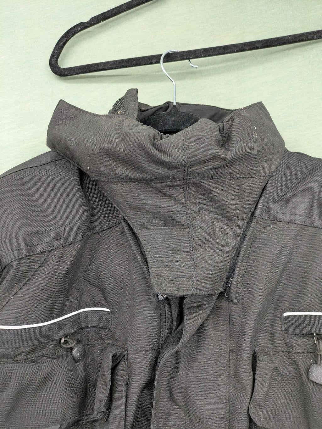Advanced Experience black motorcycle jacket with Z-Liner membrane and CE protectors, durable Cordura material.