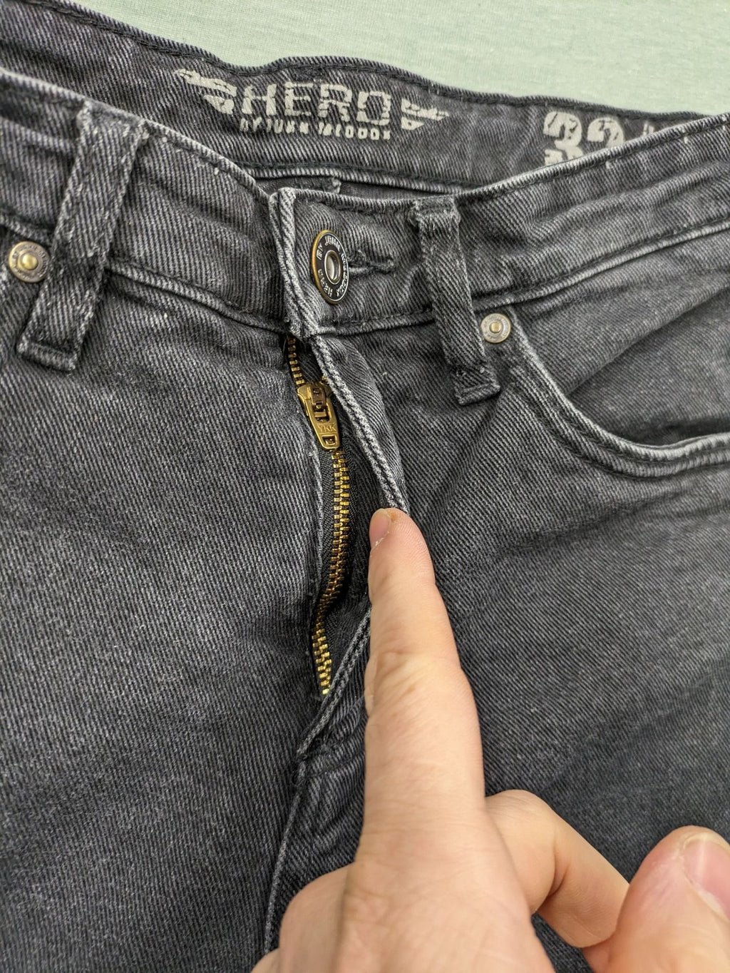 Hero by John Meddox black straight jeans with faded wash and durable cotton-stretch material.