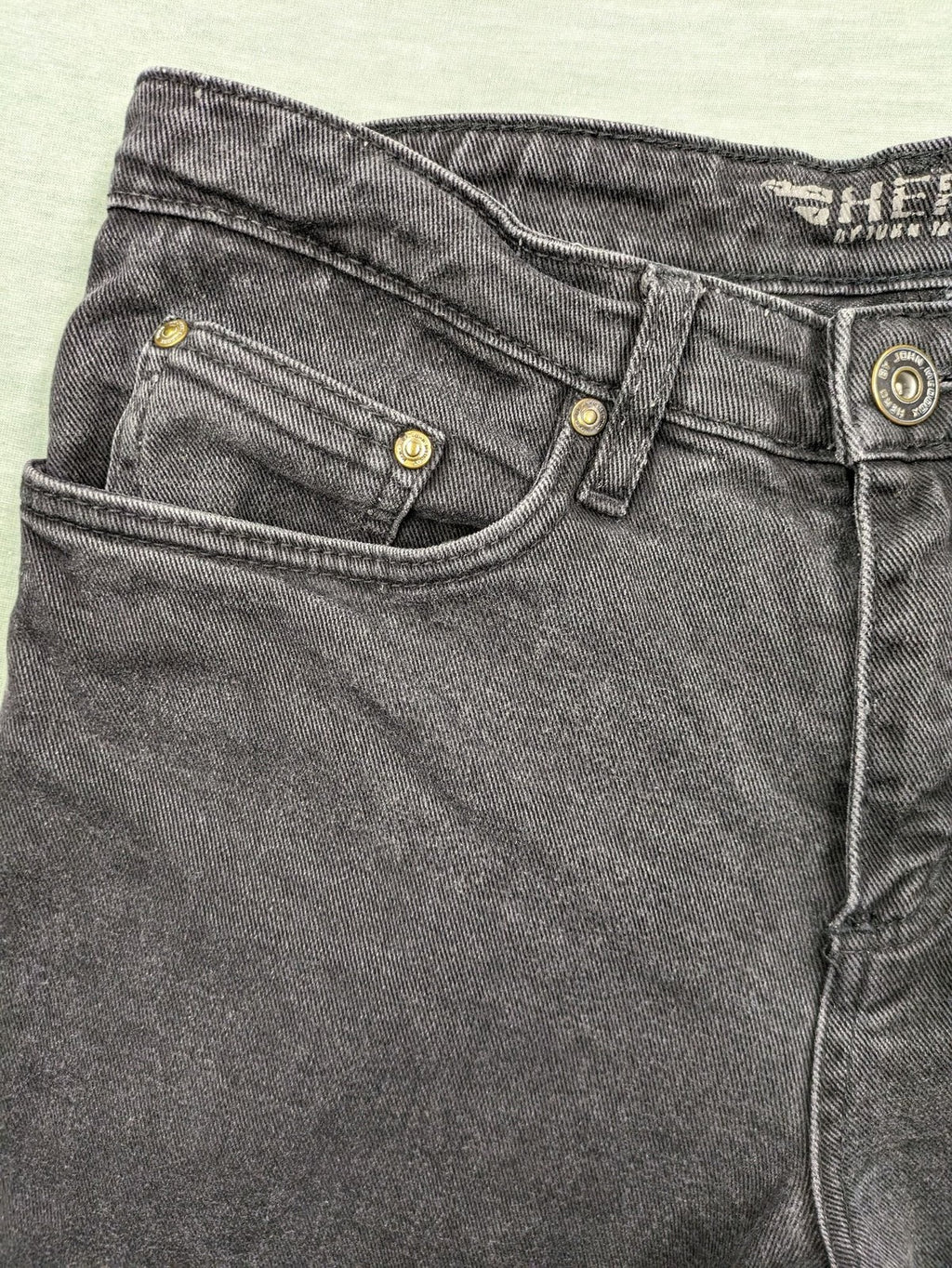 Hero by John Meddox black straight jeans with faded wash and durable cotton-stretch material.