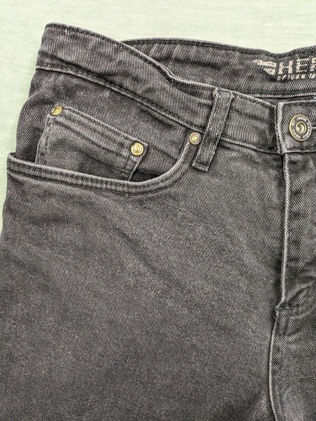 Hero by John Meddox black straight jeans with faded wash and durable cotton-stretch material.