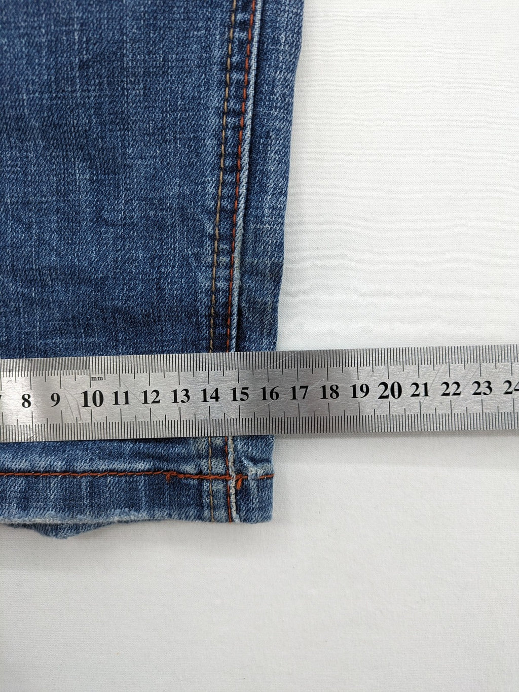 Timezone blue straight jeans slim fit with checkered pattern lining and button fly.