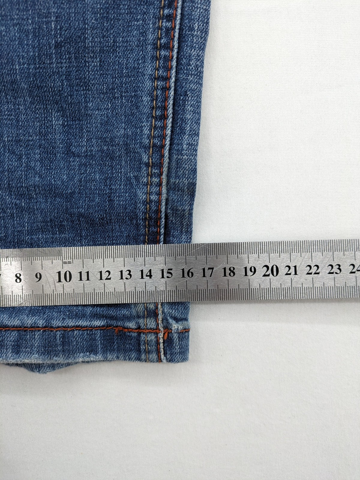 Timezone blue straight jeans slim fit with checkered pattern lining and button fly.