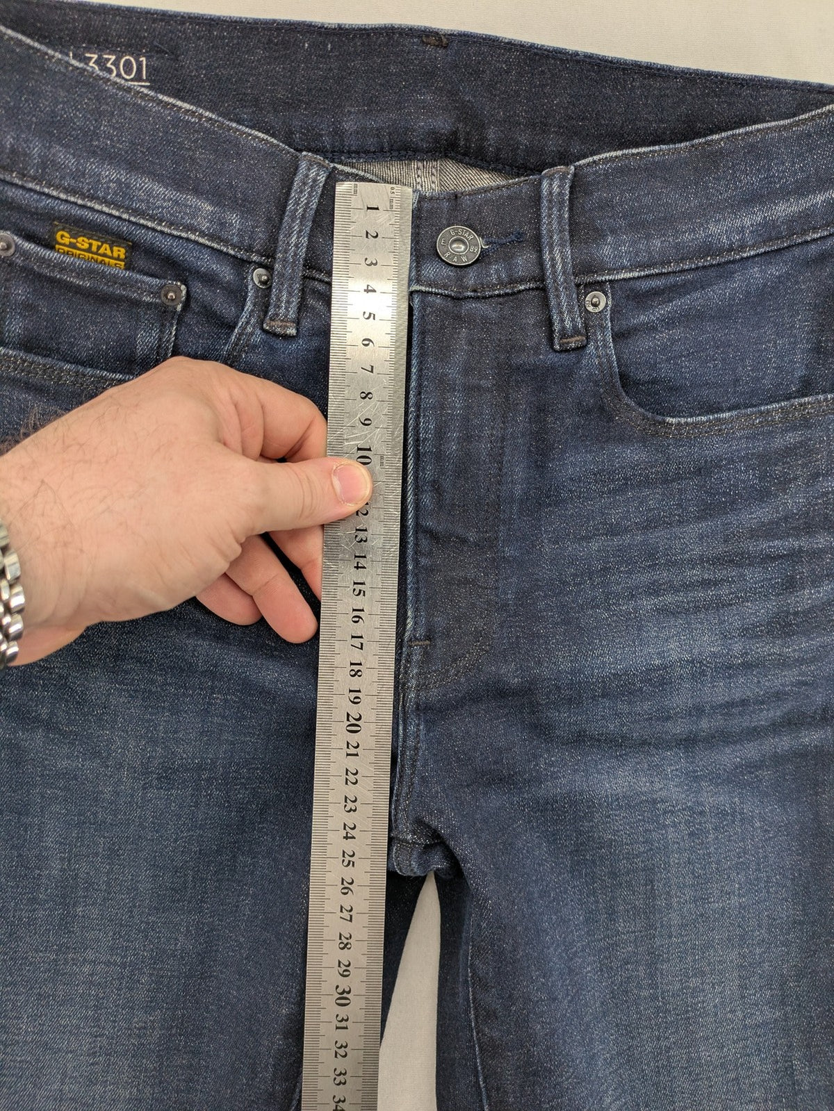 G-Star Raw blue flare jeans with classic 5-pocket design and stretch denim material.