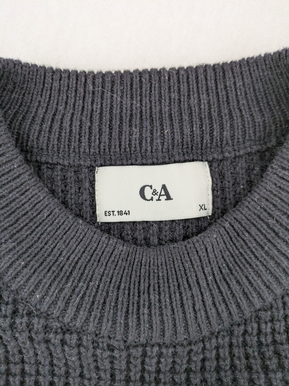 C&A turtle neck jumper black cream with Nordic pattern and waffle knit texture.